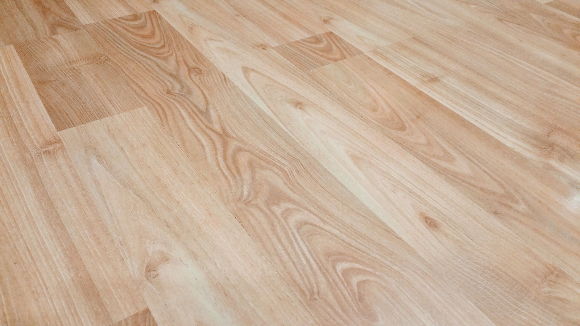 Beautiful light hardwood floor close-up showing natural wood grain