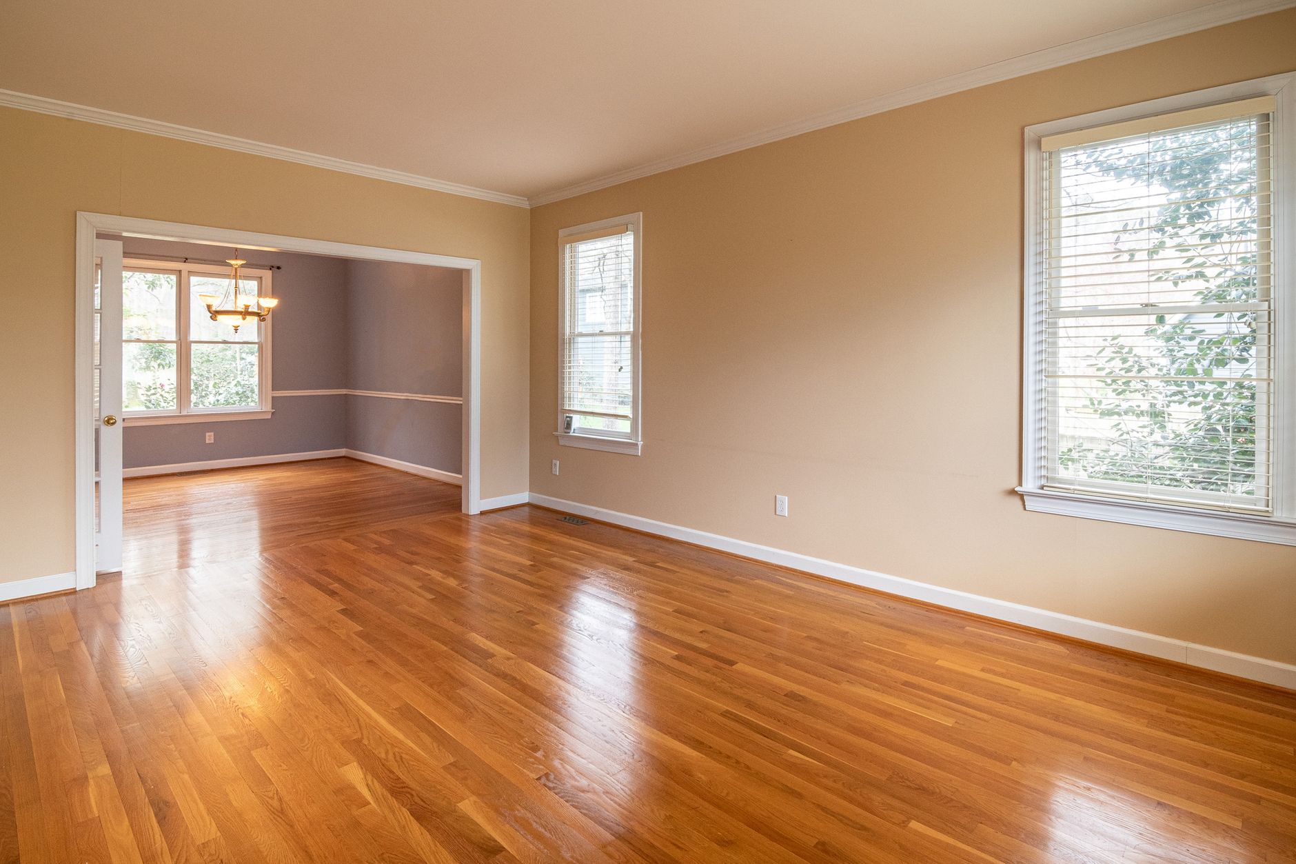 Polished hardwood floor in bright South Florida living room